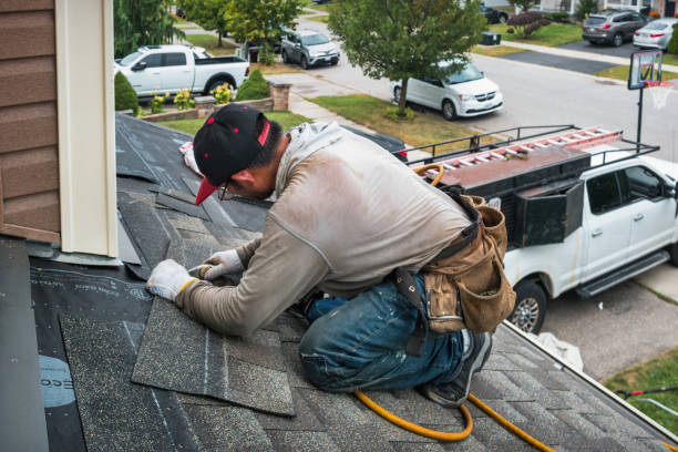 Professional Emergency Roof Repair technician working in Woburn, MA